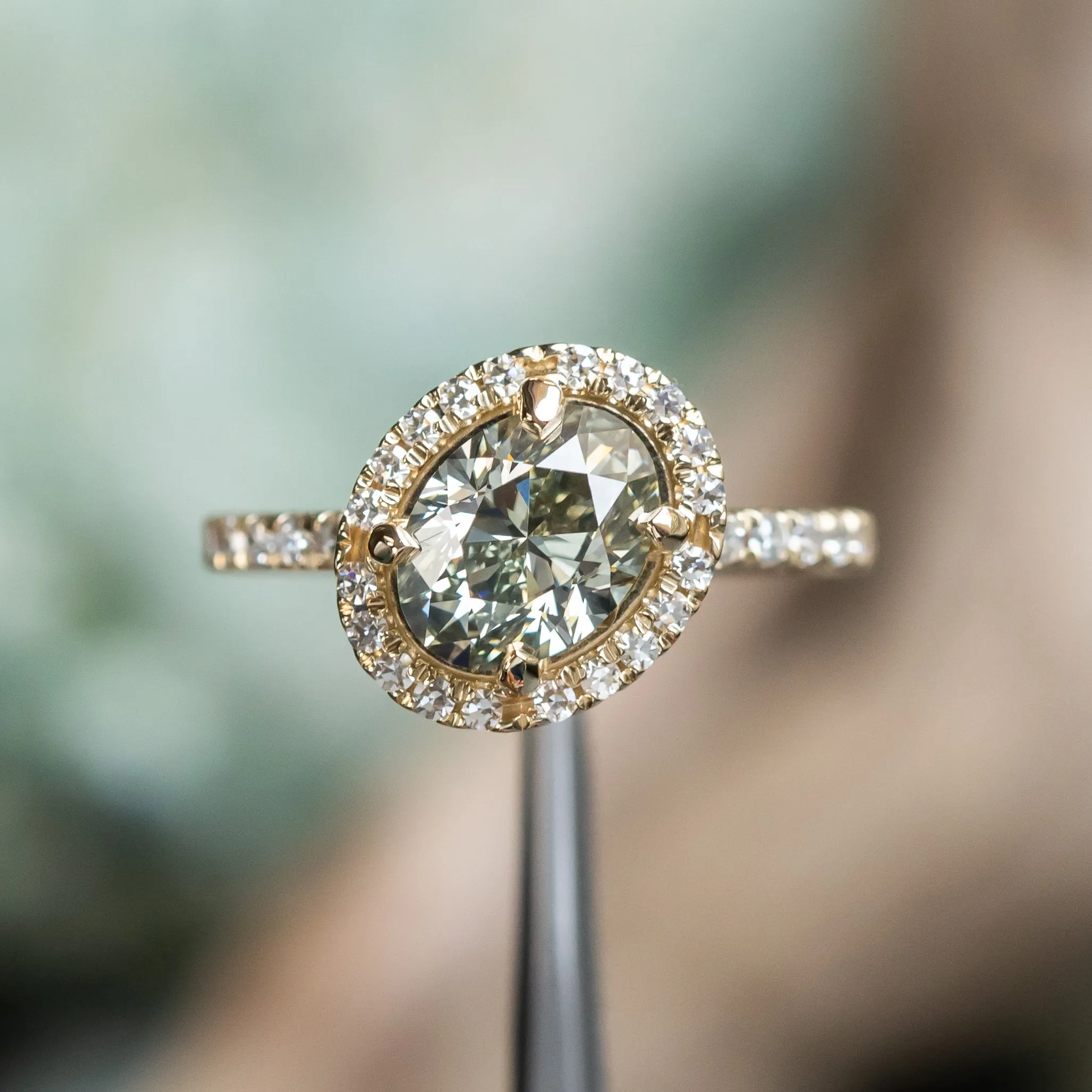 1.70ct Fancy Oval Grey Diamond and Askew Diamond Halo in 14K Yellow Gold