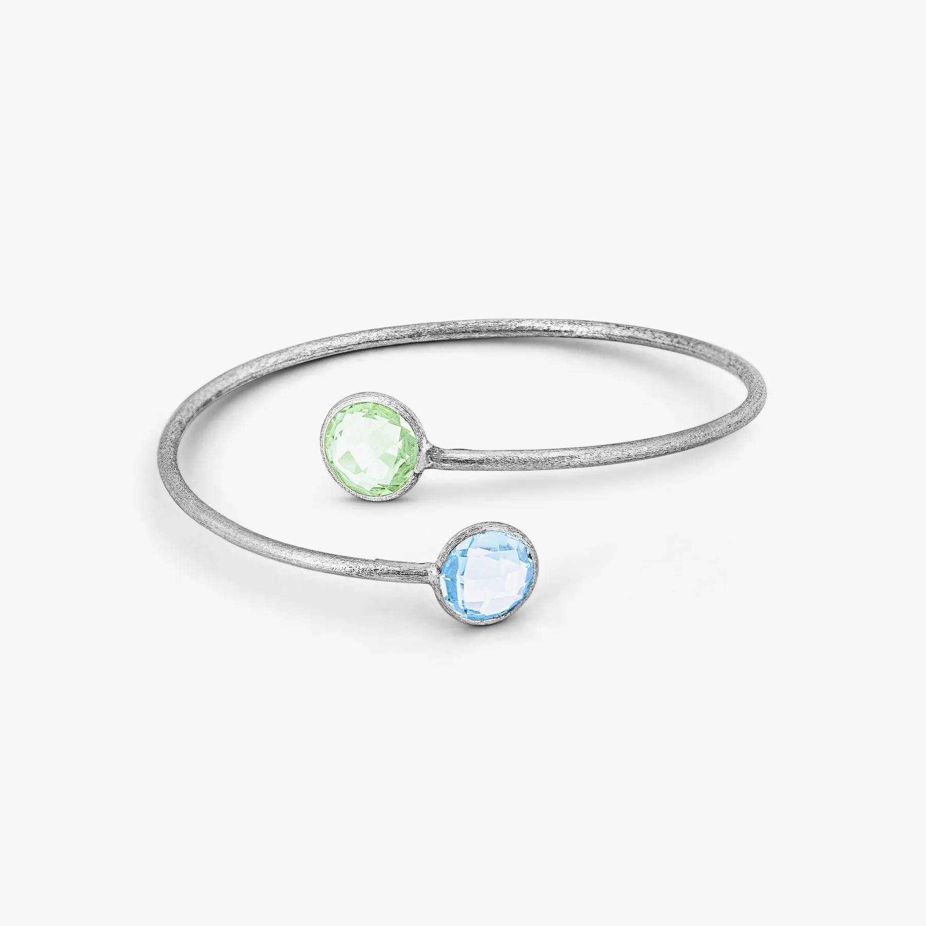 9K satin white gold Kensington bangle with topaz and green amethyst