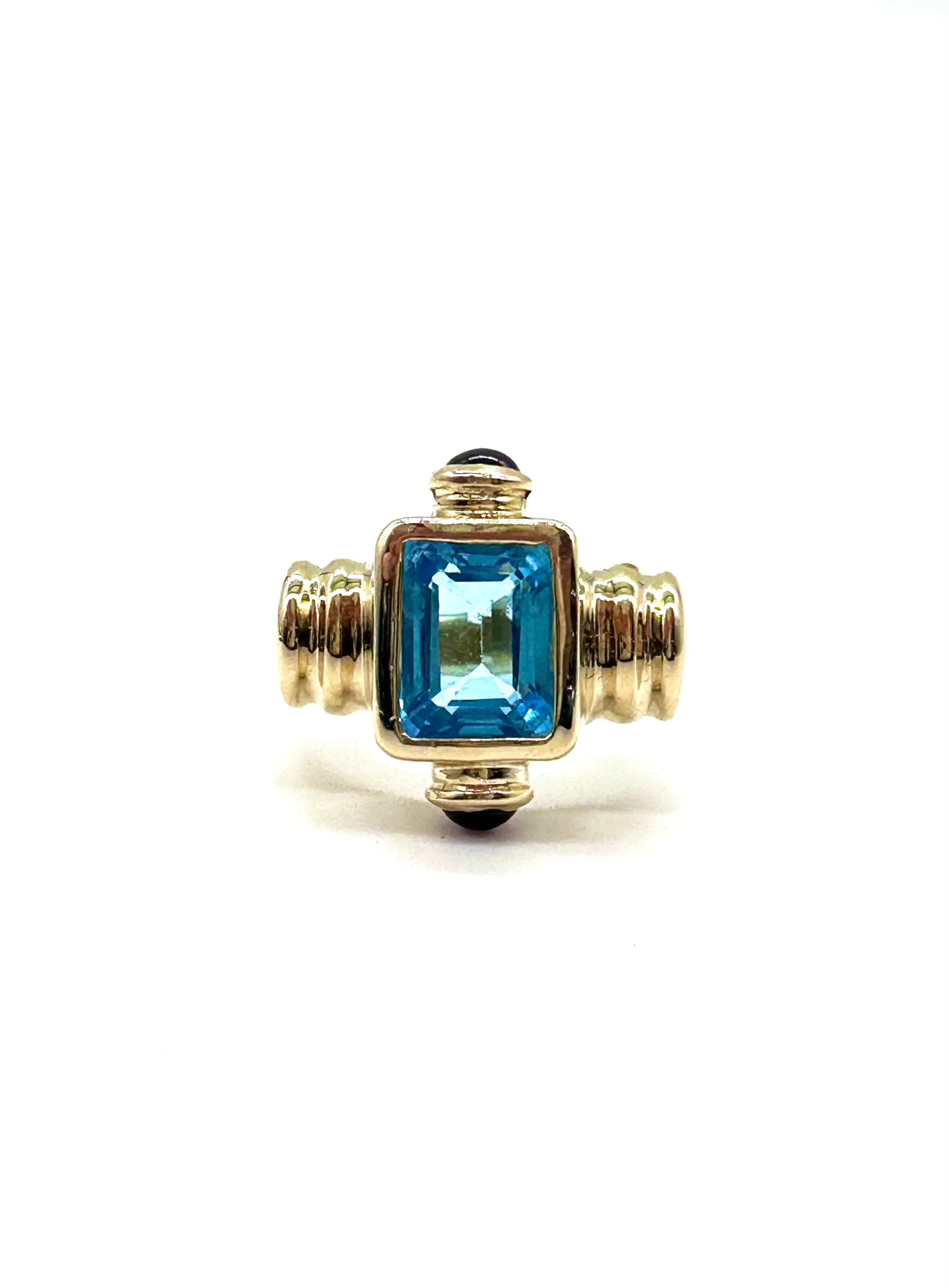 Blue Topaz & Cabochon Ruby Ring