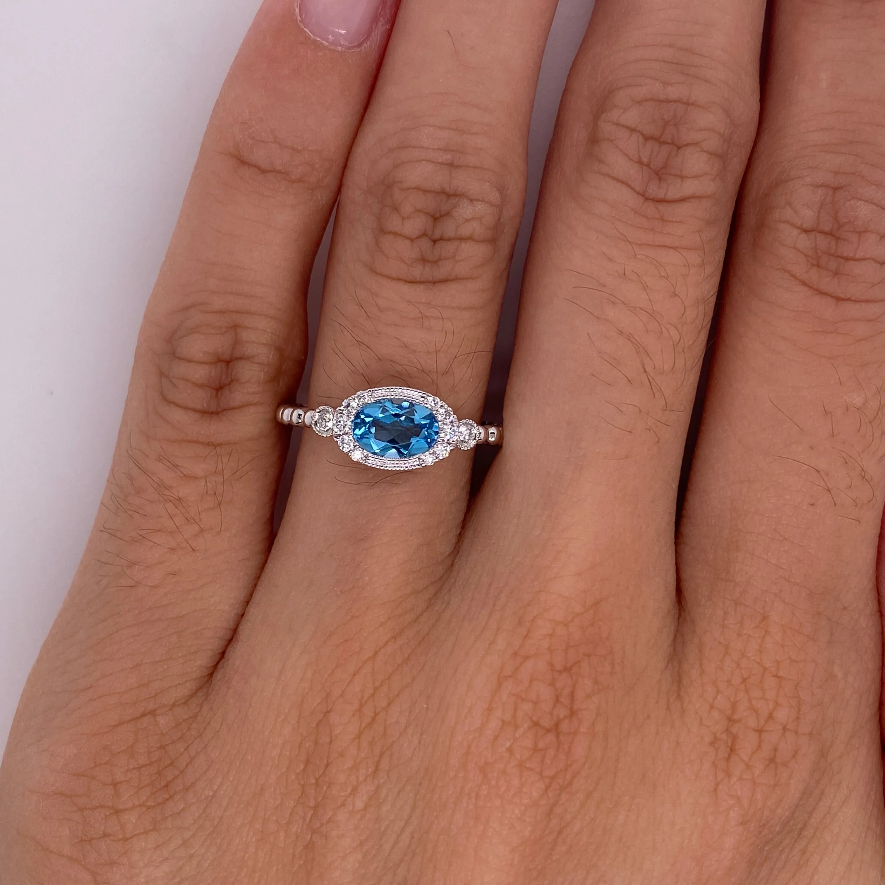 Horizontal Oval Blue Topaz Ring