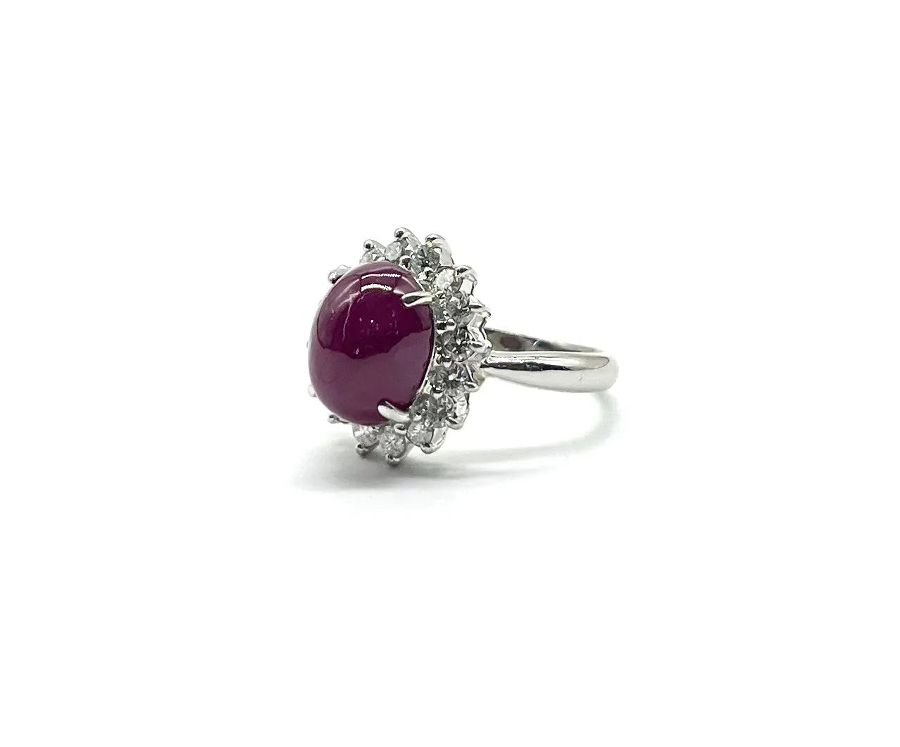 Large Cabachon Cut Ruby and Diamond Halo Ring