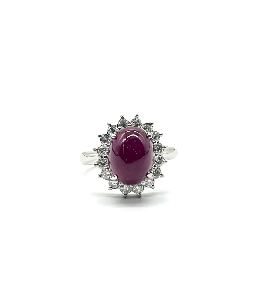 Large Cabachon Cut Ruby and Diamond Halo Ring