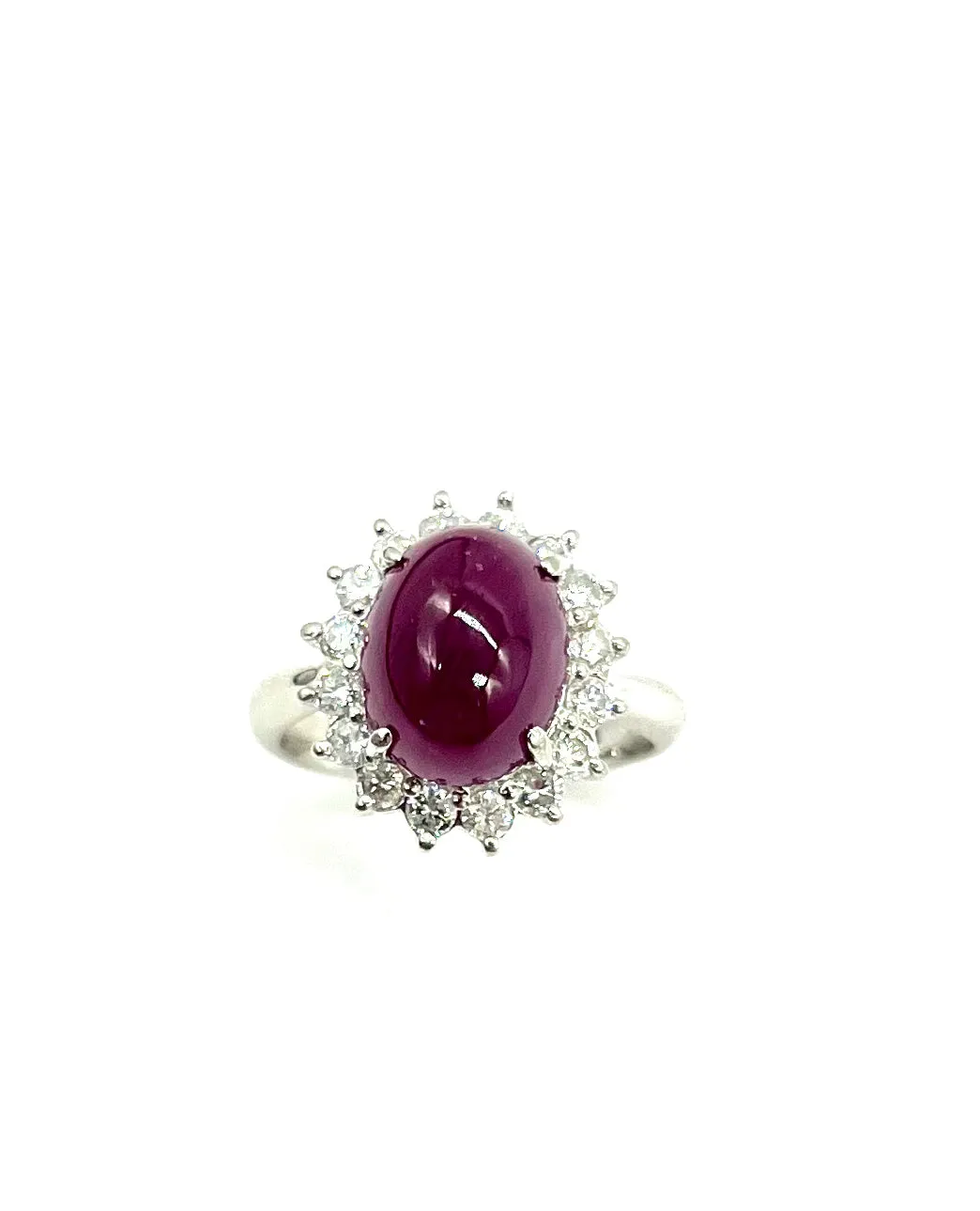 Large Cabachon Cut Ruby and Diamond Halo Ring